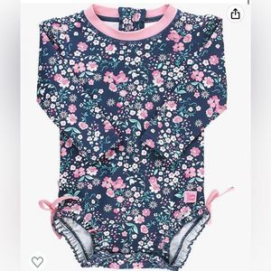 Rufflebutts long sleeve one piece with sun protection 50+